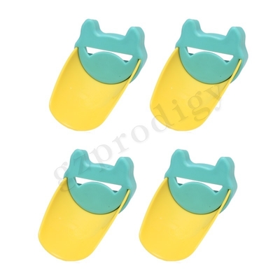 Extensor de facuet de plástico con aspecto de animal verde amarillo para niños