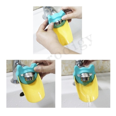 Extensor de facuet de plástico con aspecto de animal verde amarillo para niños